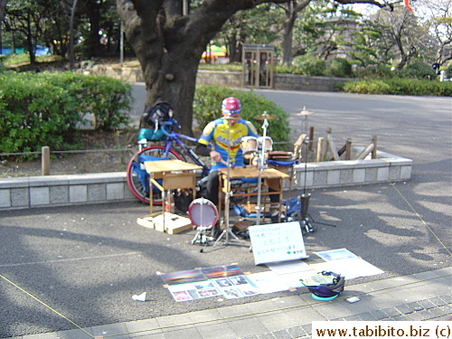 A street performer in biker's garb