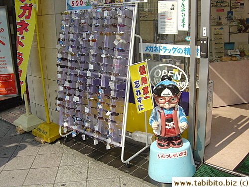 He is the icon for this glass shop, a bespectacled samurai