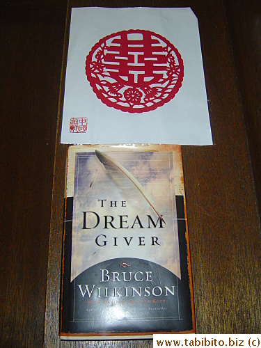 Souvenirs from our friends. Top: Chinese character cut-out, the word means happiness.  Bottom: A book brought from the US