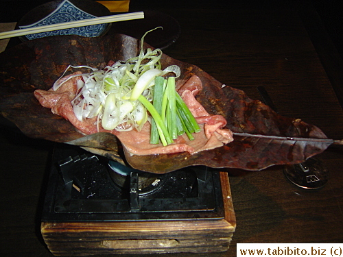 Beef tongue cooked on a special leaf