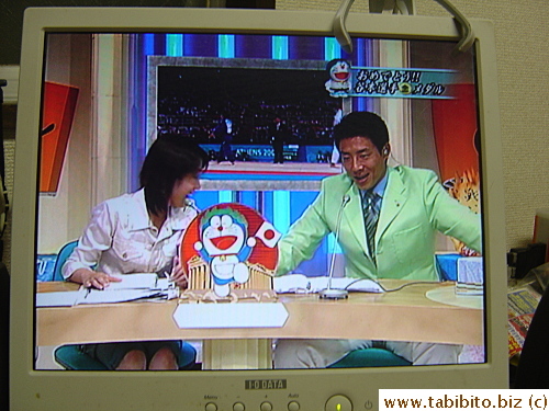 Channel 10 uses Doraemon, a long-standing cartoon cat robot, in their Olympics theme.  Four channels broadcast the Olympics in Tokyo