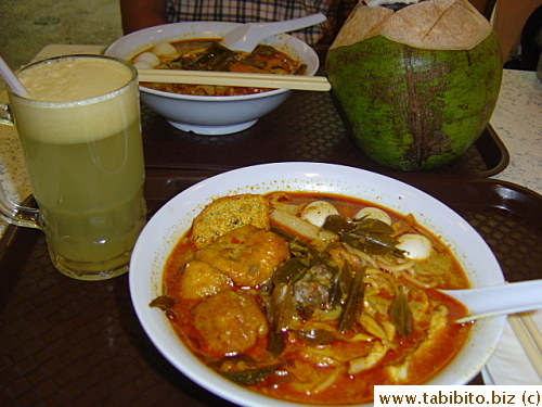 The hottest laksa I ever ate in a food court in Suria KLCC.  I also had freshly made starfruit juice while KL ordered coconut juice