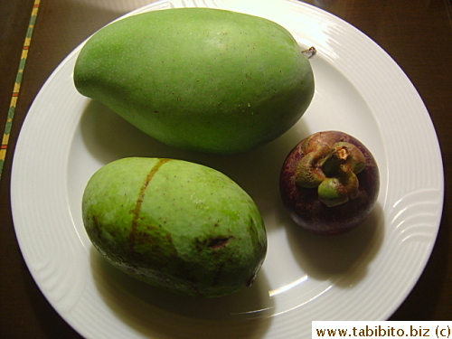 We bought mangoes and a mangosteen to eat in our room