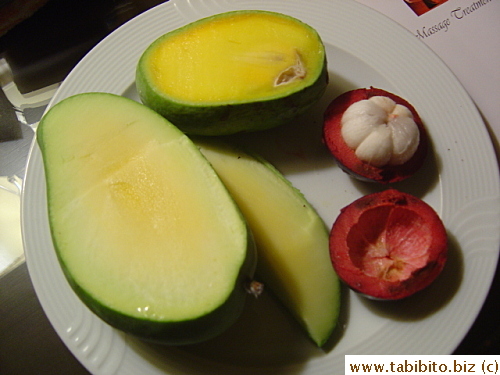 The mangoes were tart like lemon, totally inedible.  The mangosteen's also somewhat sour, but bearable