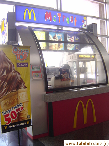 I've seen a couple of stands selling McDonald's treats.  They have McPopcorn there, interesting