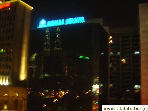 Twin Towers at night reflected in our hotel room window