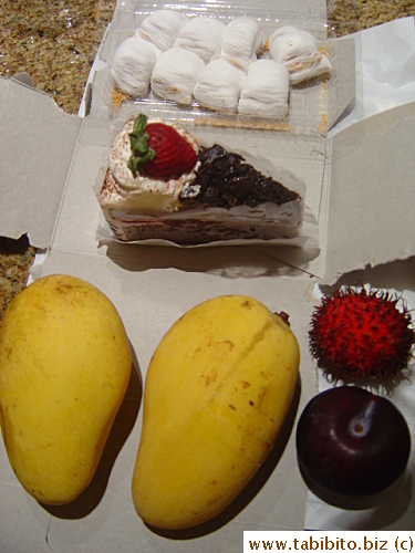 More snacks for us. The dragon beard candies weren't as good as those in Hong Kong but still quite yummy.  Black forest cake was good, mangoes were somewhat sweet, the other fruits were passable