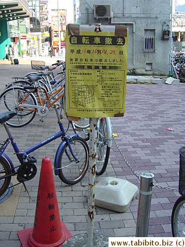 Local council regularly confiscates illegally-parked bicycles. Here they put up a notice telling people bikes have been removed on Oct 28th and 29th and gives details on where owners can go to retrieve them and the cost incurred