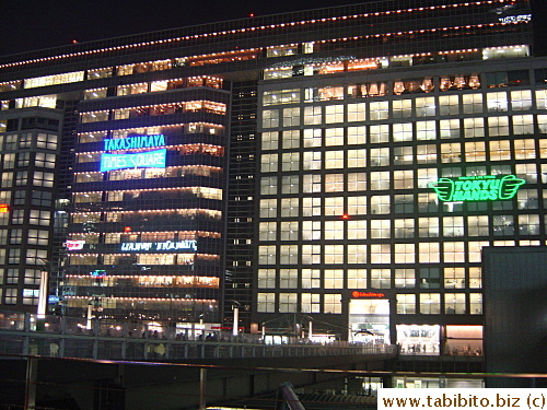 Times Square that houses Takashimaya Dept Store and Tokyu Hands brightly lit at night