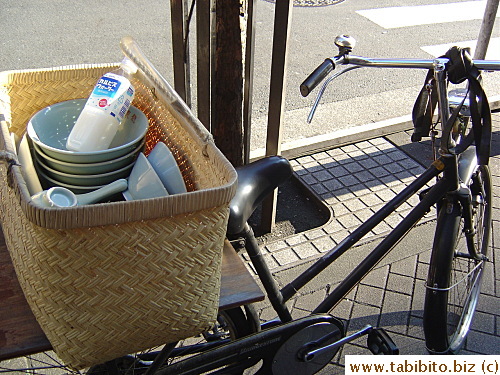 A bike collecting dirty dishes from delivered ramen