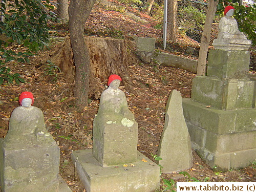 These statues all have a red cap on