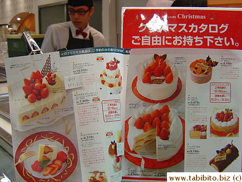 Christmas cakes catalogues given out at a cake shop for people to place their cake order before Christmas