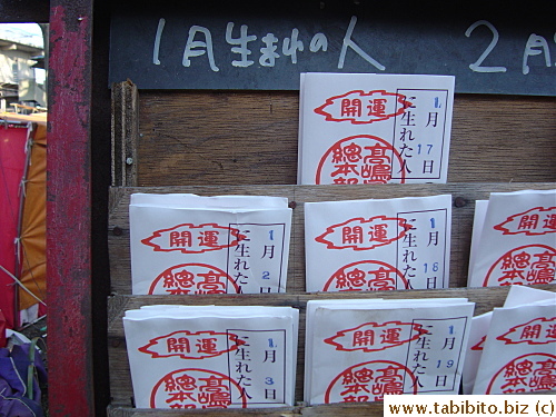 KL's and my fortune slips are placed side by side under the month of January