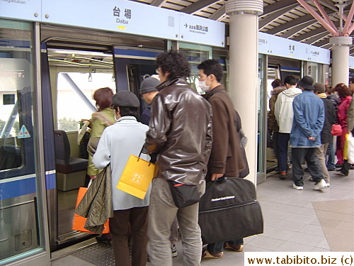 Passengers getting on board the train