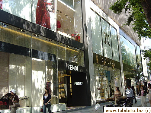 Big name stores line Omotesando.  In this picture: Fendi, Celine, Donna Karan