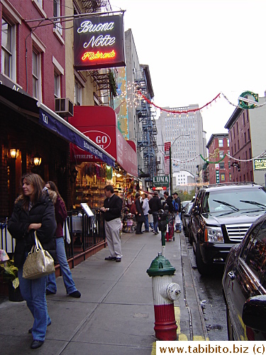 The Italian flag colors are ubiquitous in Little Italy