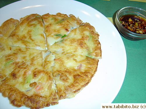 Korean style seafood pancake.  It's very thick, doughy and greasy