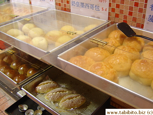 Typical HK style bread: top tier right is pineapple bun, a soft and fluffy bun with a crunchy sweet crust on top