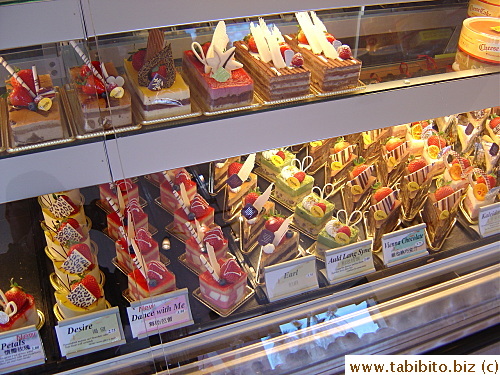 Pretty cakes at the counter of a café where they stopped for drinks after the Shanghai lunch