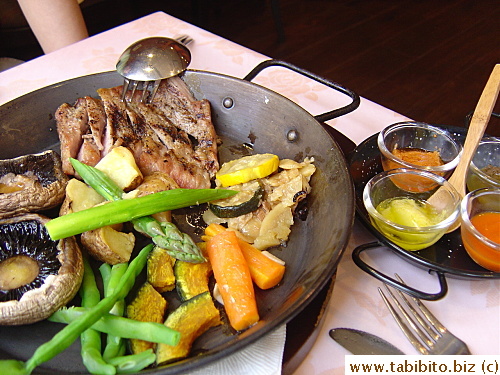 Grilled Iberia pork and vegetables served with four kinds of sauces.  This is a serving for two