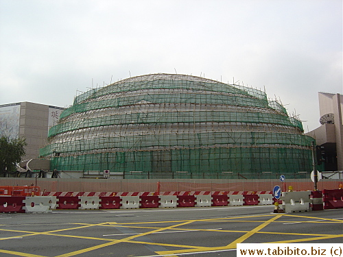 The Space Museum under maintanence work the Hong Kong way: covered in bamboo poles and green mesh