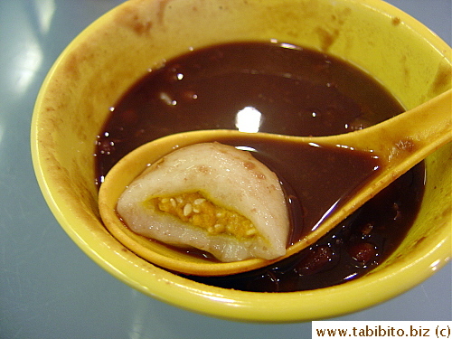 Honeymoon Dessert's glutinous balls have atypical filling of white sesame paste