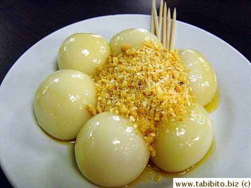 Plain Glutinous Balls with chopped peanuts, sesame seeds and sugar toppings HK$16/US$2  Chewy and sweet, awesome