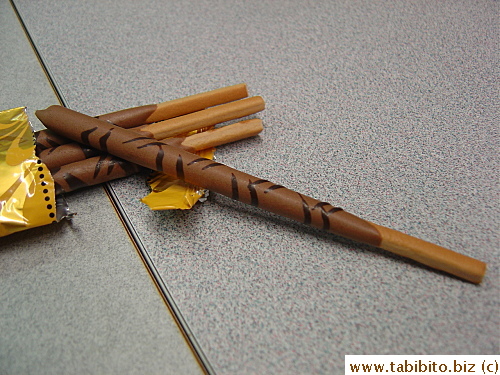 Marble Pocky equals: Chocolate cookie, chocolate mousse, and dark chocolate swirls