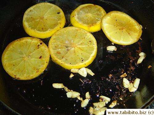 Sauteeing the lemon and garlic after browning the chicken