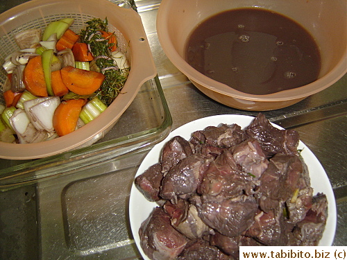 Meat, veggies, and liquid separated before cooking