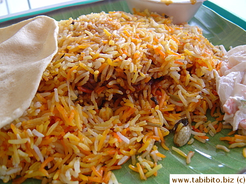 There's a large piece of mutton buried inside the fragrant rice
