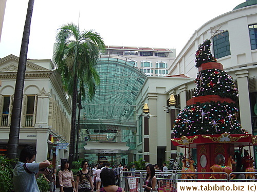 The glass-covered shopping area outside Bugis station