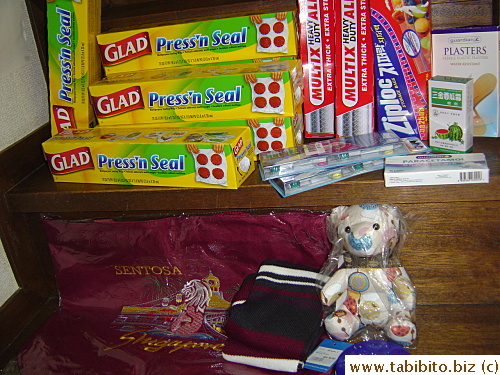 Got 7 rolls of Press'n seal, not available in Japan yet (I bought the ziploc bags cause I forgot to bring my own).  The bear is a gift from LeSportsac.  The tote bag is a gift for a friend.  We didn't go to Sentosa