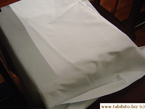 A staff immediately brought us a basket to store our bags and attentively draped it with a cover