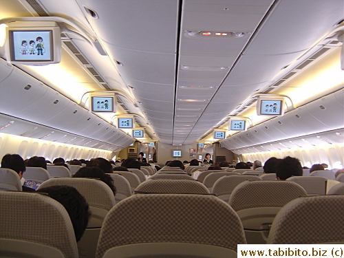 The plane to Osaka was larger than I thought (10 seats across), and not full.  We got the tickets free by using our mileage points, so the seats felt extra comfy, haha!