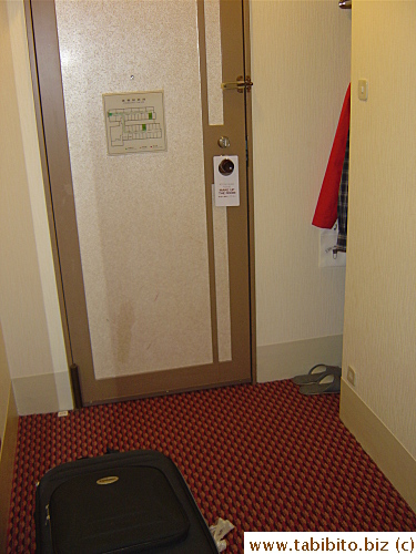 A small area in front of the toilet