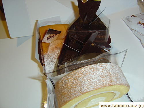 Delicious bitter chocolate cakes from Shin, and cheesecake for KL, swiss roll for David