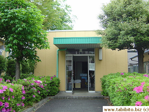 Is the small building where a meeting room is converted into a funeral parlor