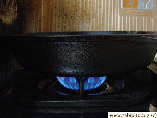 Heat the pizza on medium flame for about 5 minutes or so