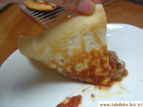 The larger sized pizza had way too much sauce and the center got sauce-logged