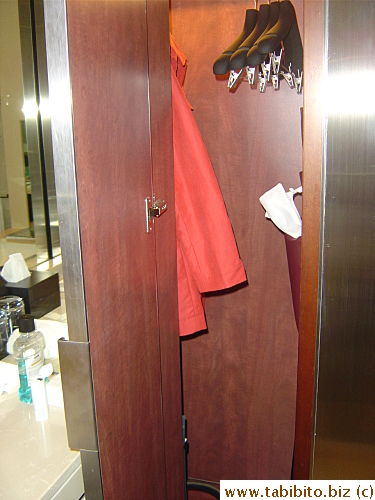 The mirror also opens to the closet in the hallway