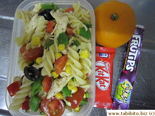 Pasta salad, mandarin, KitKat, candies