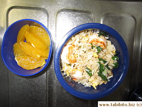 Thai fried rice with shrimps, basil and fish sauce, orange
