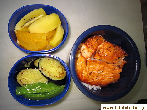 Grilled salmon, seared eggplant, stirfried snow peas, golden kiwi and mandarin