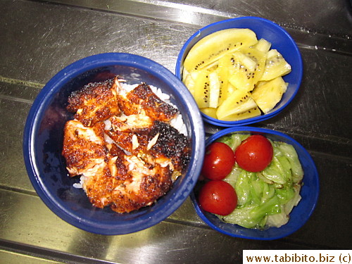Cajun fish, sauteed lettuce, cherry tomatoes, kiwi