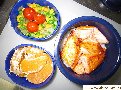 Grilled salmon, mixed vegetables, seared cherry tomatoes, orange