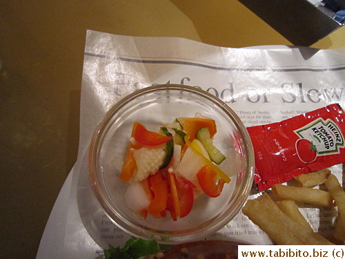 Besides the mountain of fries, there's also this dish of pickled veggies