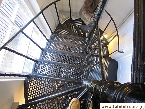 Coming down on dizzying spiral stairs