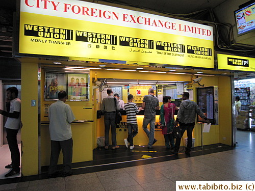 Western Union inside Chungking Mansions has the best exchange rate and no service charge