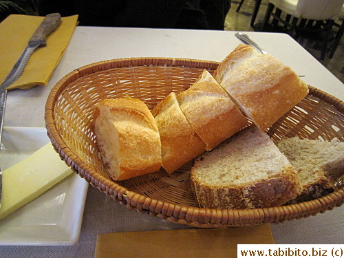 Warm baguette (crunchy crust and soft innards) and country loaf